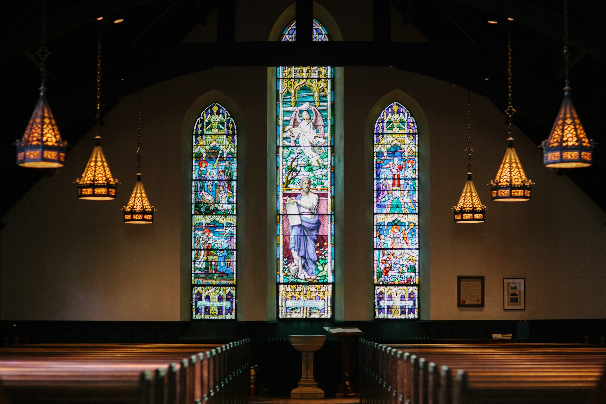 Light falling through the arches of a church interior